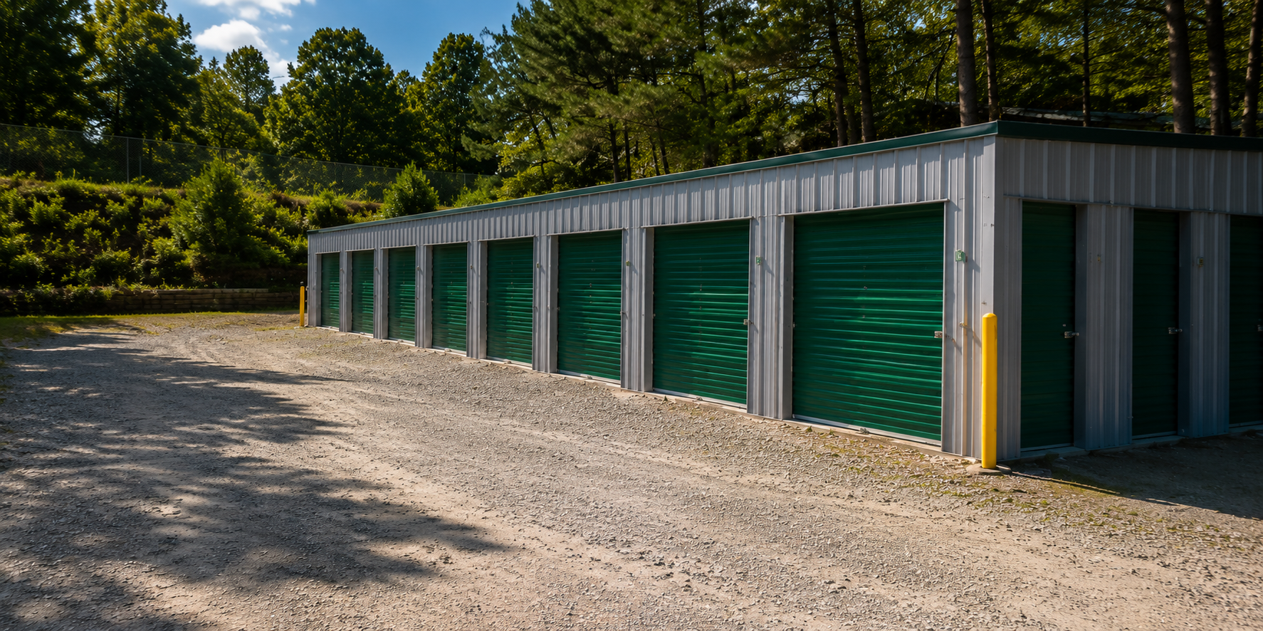 Rows of green drive-up storage units at Ellijay Storage on Yukon Road